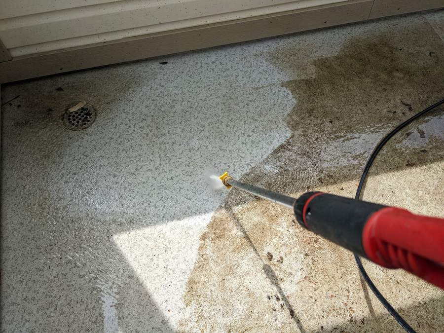 Detailed pressure washing of textured concrete